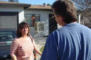 Woman crying in driveway