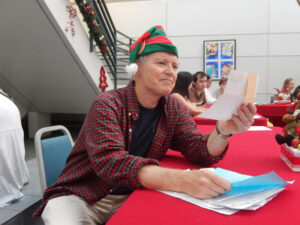 Patrick Reynolds holding Santa Letters